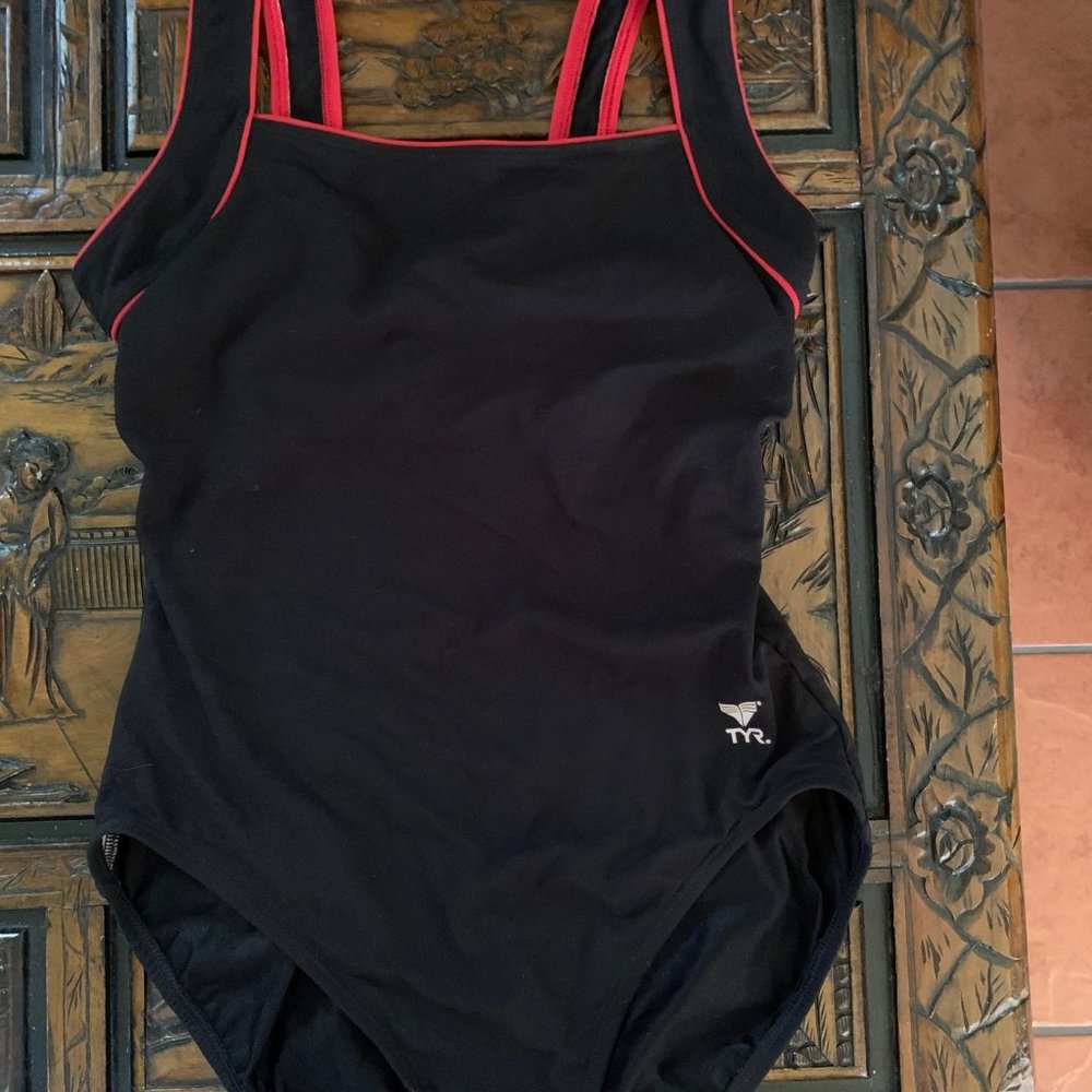 Swimsuit, size 8. TYR, 100 % Polyester, strech performance, Black and red.